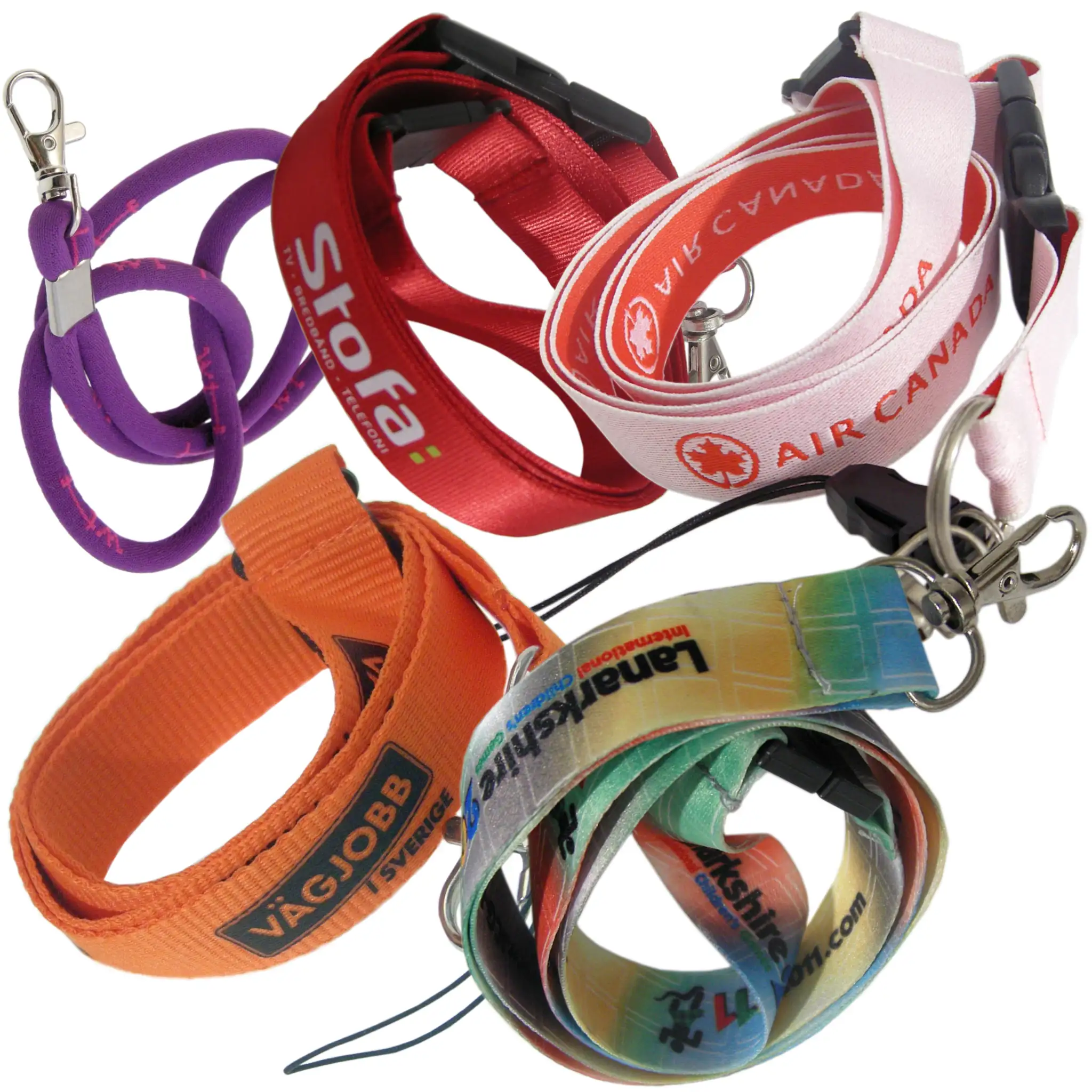 Massor av nyckelband med tryck, några med tryckt logotyp och några med vävd logga.